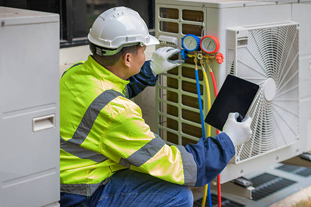 Professional Emergency Hvac Repair technician working in Triangle, VA